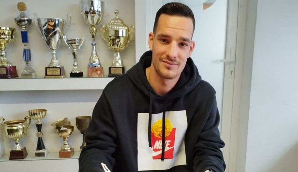 A generic square placeholder image with rounded corners in a figure.