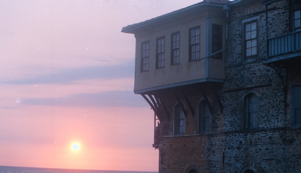 A generic square placeholder image with rounded corners in a figure.