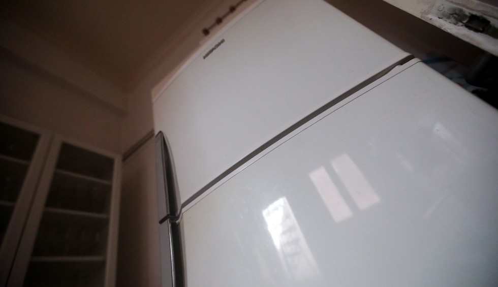 A generic square placeholder image with rounded corners in a figure.