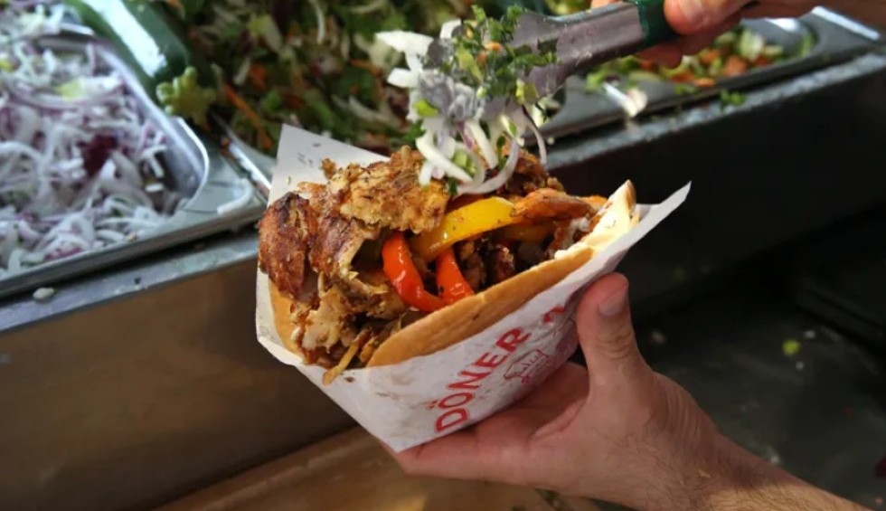 A generic square placeholder image with rounded corners in a figure.