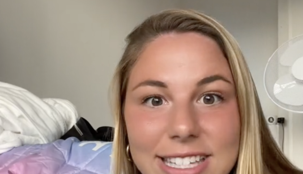 A generic square placeholder image with rounded corners in a figure.