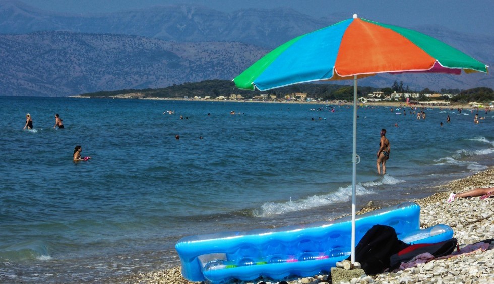 A generic square placeholder image with rounded corners in a figure.