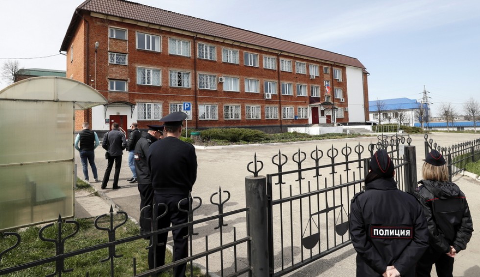 A generic square placeholder image with rounded corners in a figure.