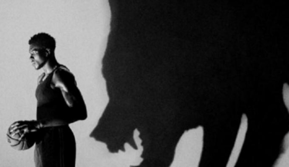 A generic square placeholder image with rounded corners in a figure.