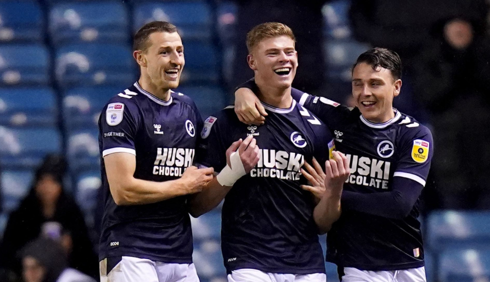 A generic square placeholder image with rounded corners in a figure.