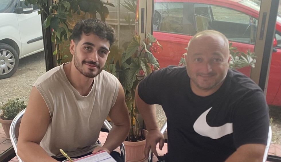 A generic square placeholder image with rounded corners in a figure.