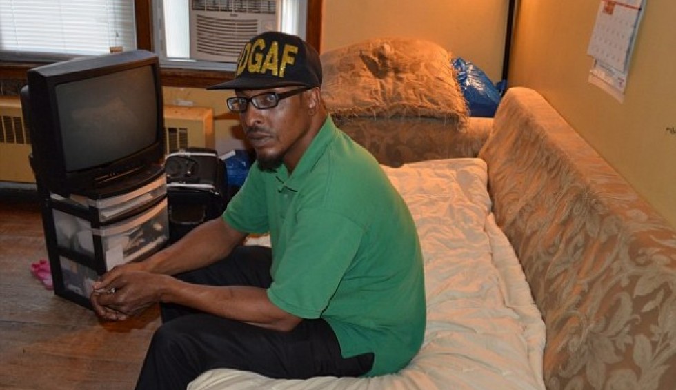 A generic square placeholder image with rounded corners in a figure.