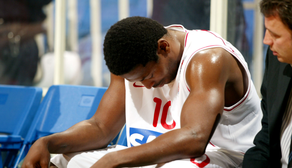 A generic square placeholder image with rounded corners in a figure.