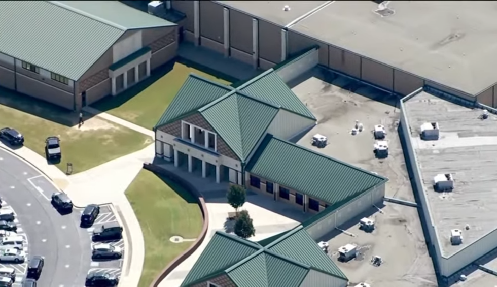 A generic square placeholder image with rounded corners in a figure.