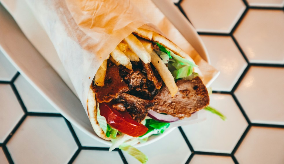 A generic square placeholder image with rounded corners in a figure.