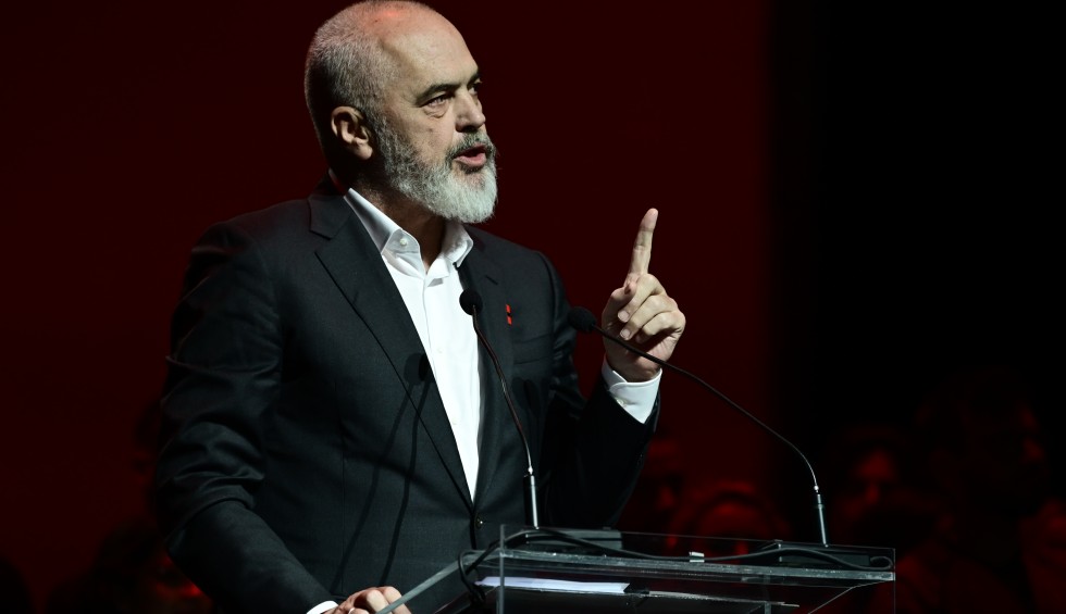 A generic square placeholder image with rounded corners in a figure.