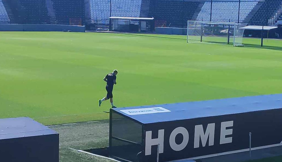 A generic square placeholder image with rounded corners in a figure.