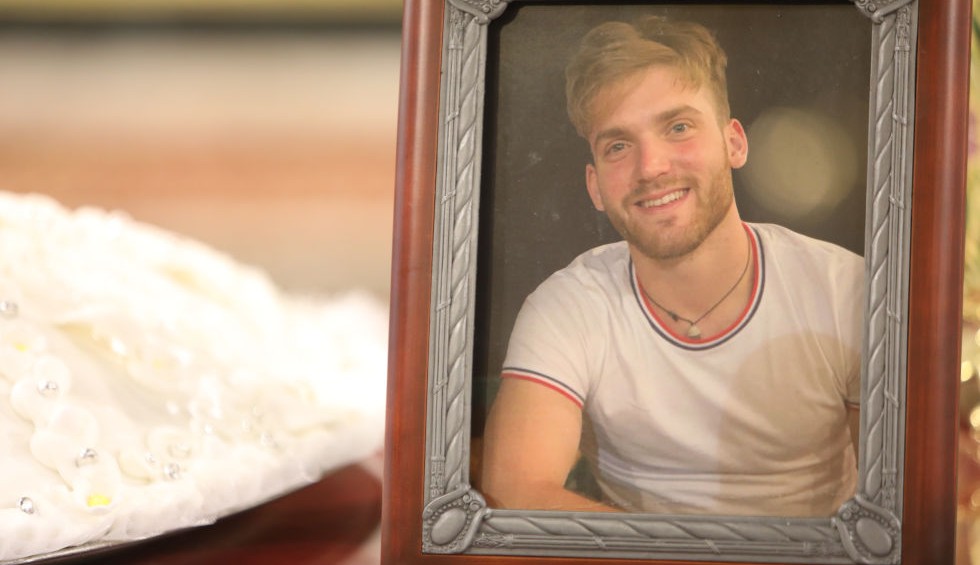 A generic square placeholder image with rounded corners in a figure.