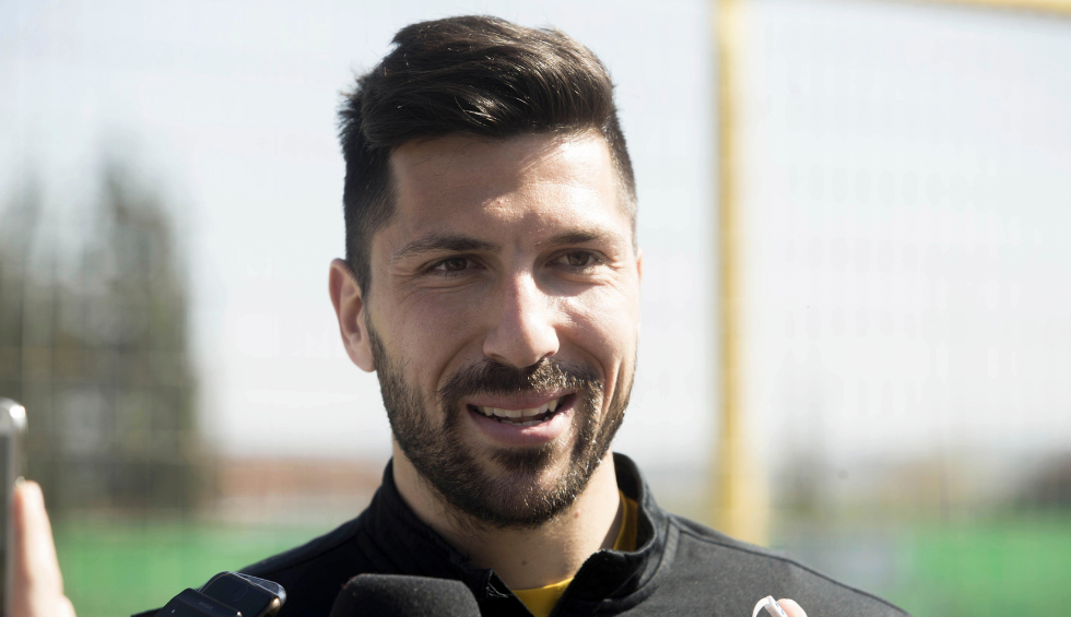 A generic square placeholder image with rounded corners in a figure.