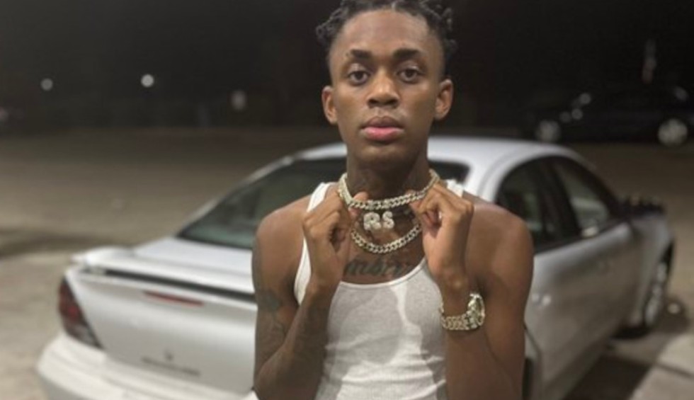 A generic square placeholder image with rounded corners in a figure.