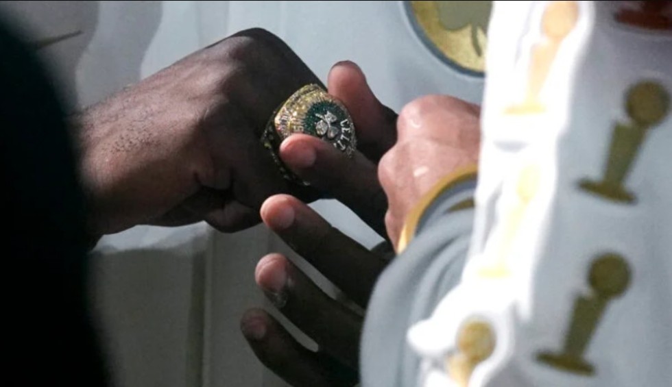 A generic square placeholder image with rounded corners in a figure.