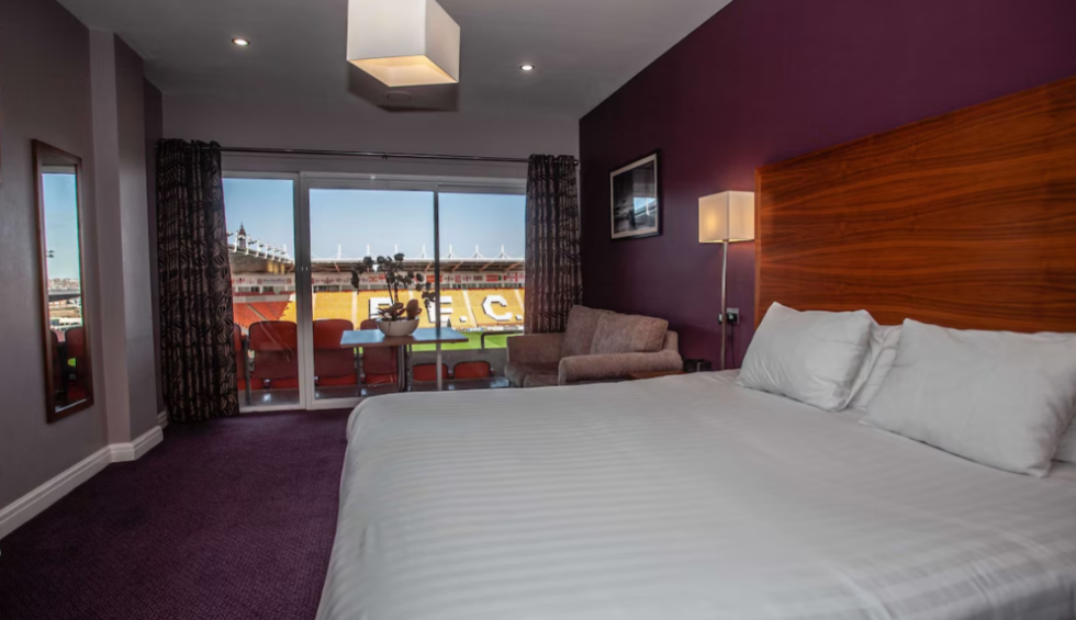 A generic square placeholder image with rounded corners in a figure.