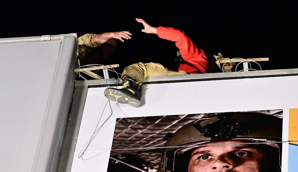 A generic square placeholder image with rounded corners in a figure.