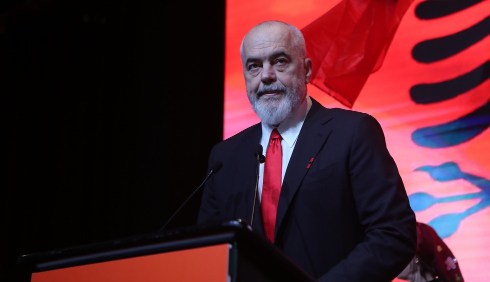 A generic square placeholder image with rounded corners in a figure.