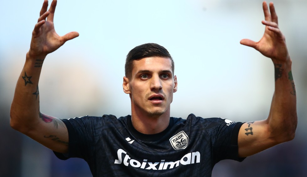 A generic square placeholder image with rounded corners in a figure.