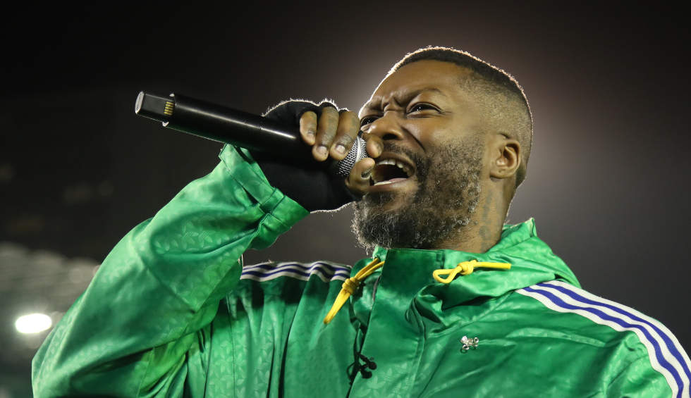 A generic square placeholder image with rounded corners in a figure.