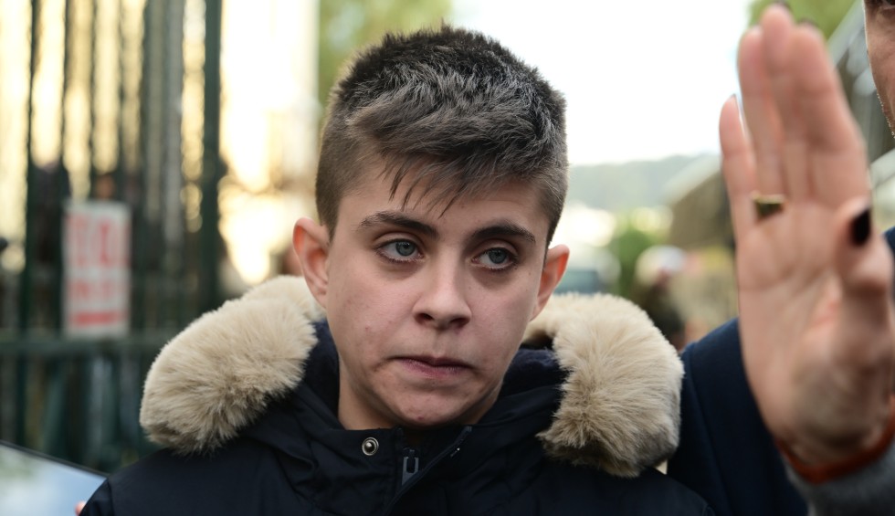 A generic square placeholder image with rounded corners in a figure.