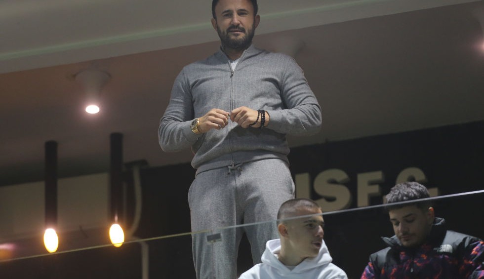 A generic square placeholder image with rounded corners in a figure.