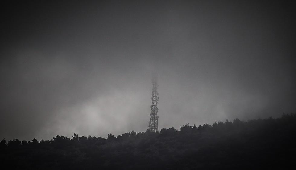 A generic square placeholder image with rounded corners in a figure.