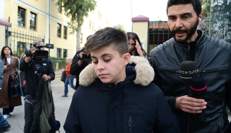 A generic square placeholder image with rounded corners in a figure.