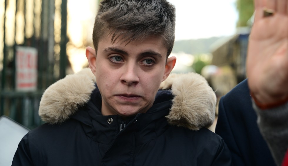 A generic square placeholder image with rounded corners in a figure.