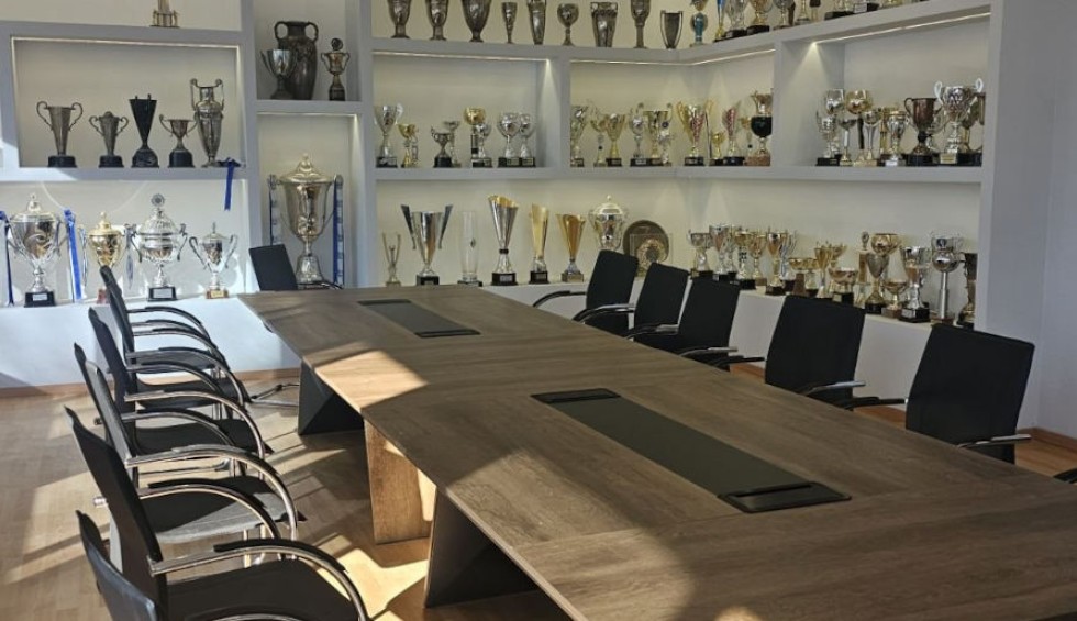 A generic square placeholder image with rounded corners in a figure.