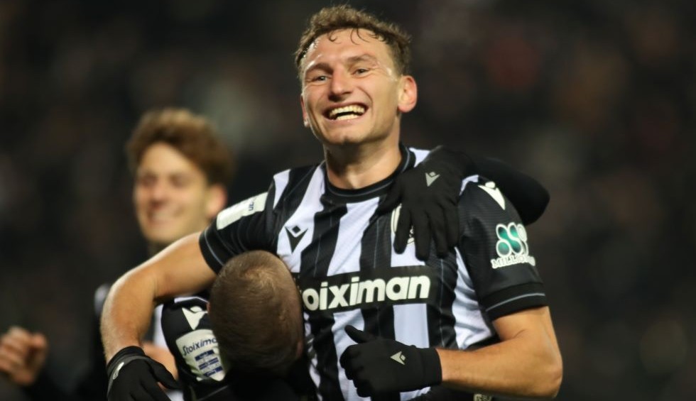 A generic square placeholder image with rounded corners in a figure.