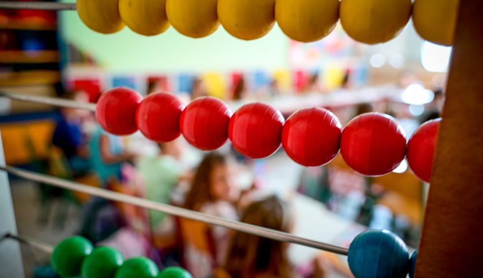 A generic square placeholder image with rounded corners in a figure.