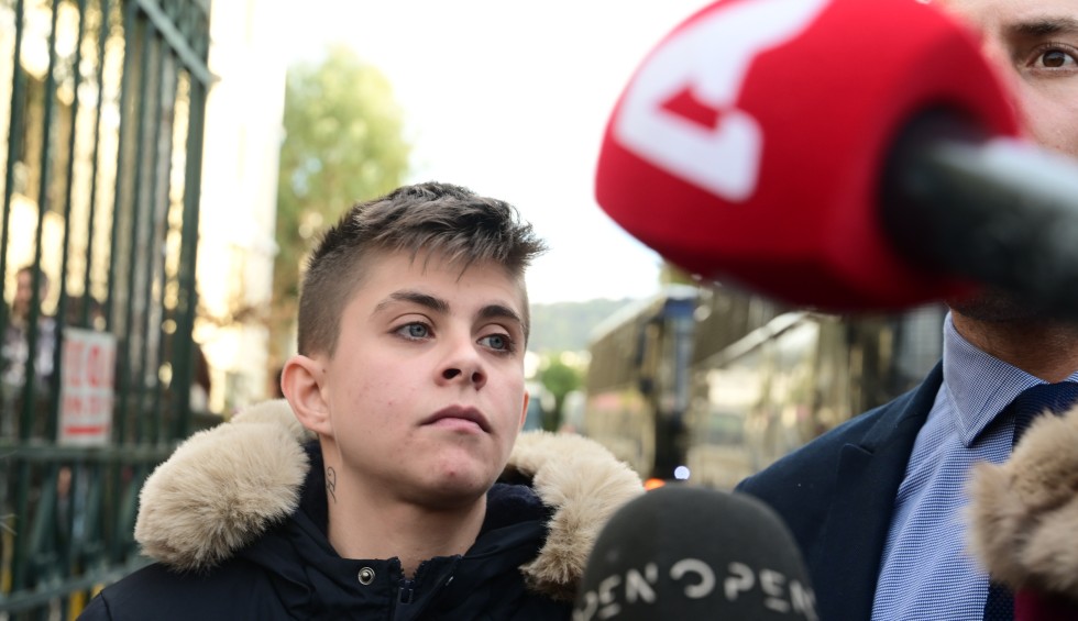 A generic square placeholder image with rounded corners in a figure.