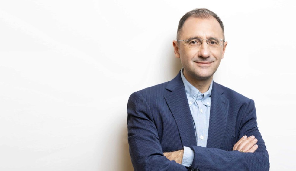 A generic square placeholder image with rounded corners in a figure.