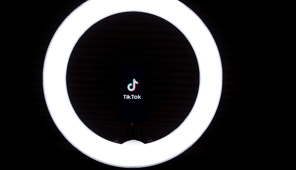 A generic square placeholder image with rounded corners in a figure.