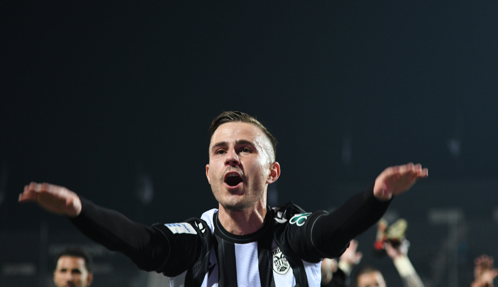 A generic square placeholder image with rounded corners in a figure.