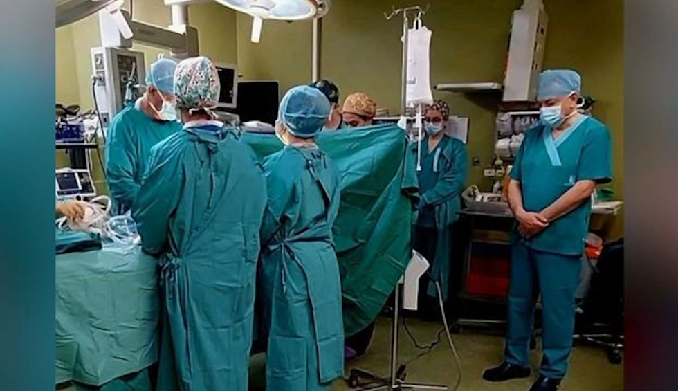 A generic square placeholder image with rounded corners in a figure.