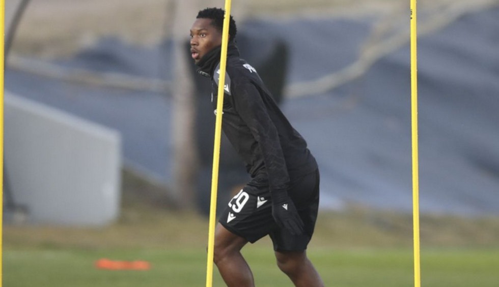 A generic square placeholder image with rounded corners in a figure.