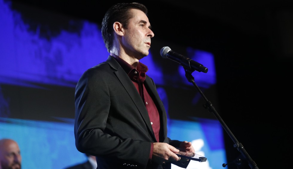 A generic square placeholder image with rounded corners in a figure.