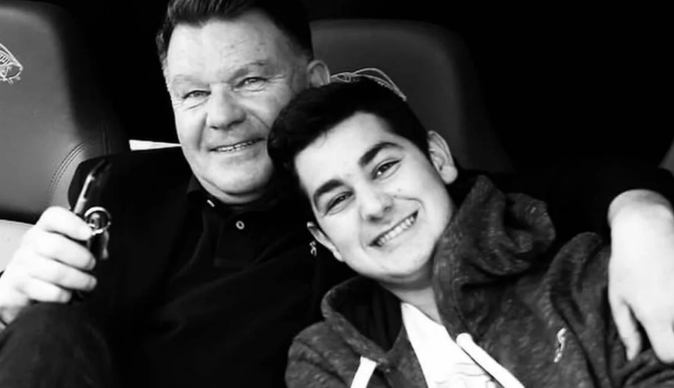 A generic square placeholder image with rounded corners in a figure.