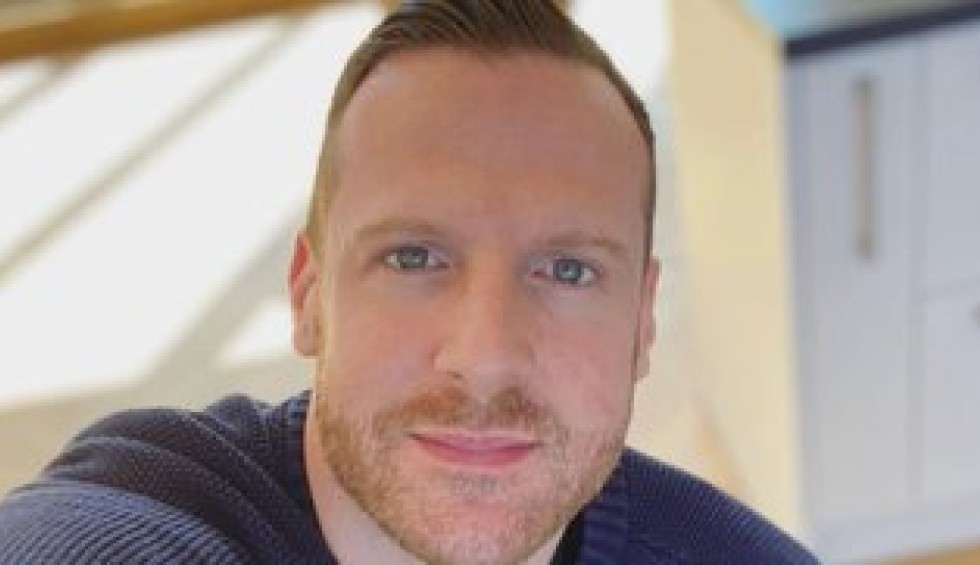 A generic square placeholder image with rounded corners in a figure.