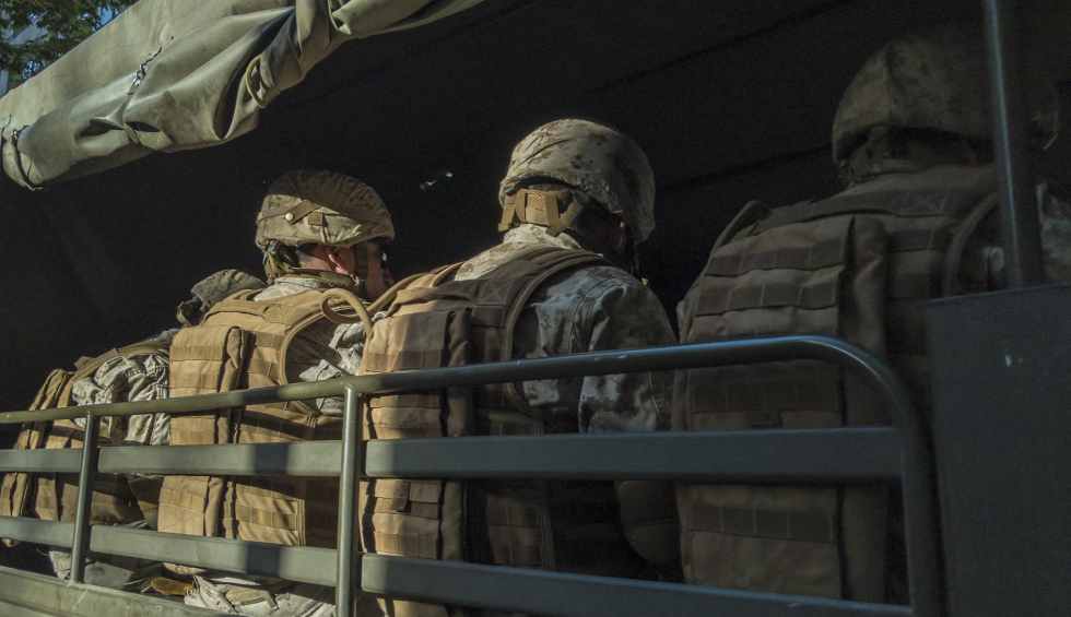 A generic square placeholder image with rounded corners in a figure.