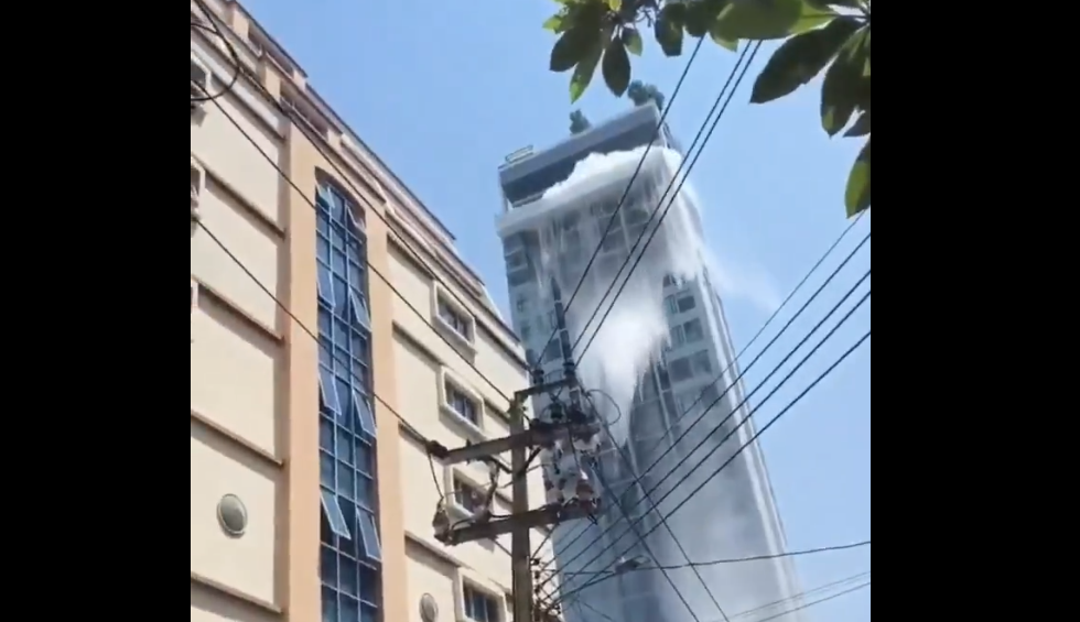 A generic square placeholder image with rounded corners in a figure.