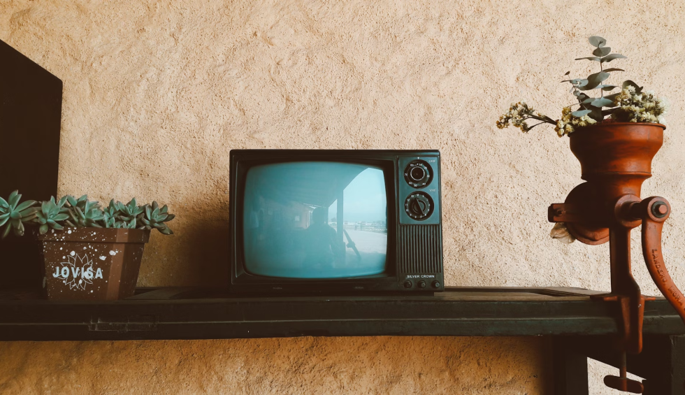 A generic square placeholder image with rounded corners in a figure.