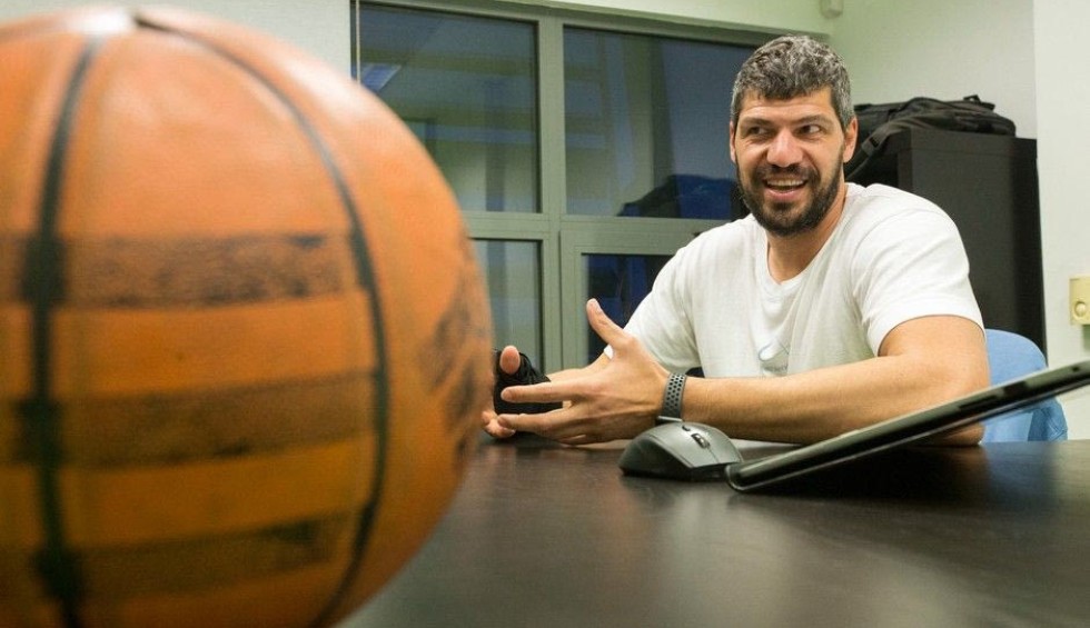 A generic square placeholder image with rounded corners in a figure.