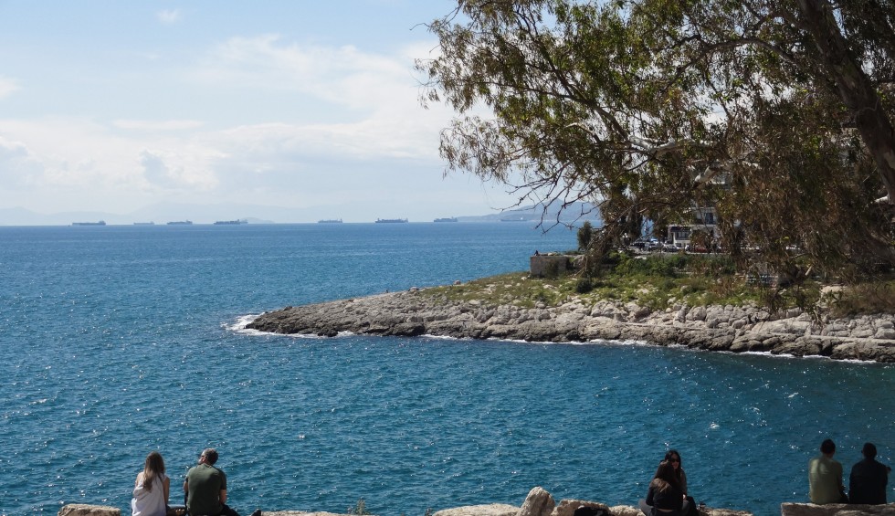 A generic square placeholder image with rounded corners in a figure.