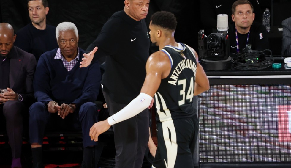 A generic square placeholder image with rounded corners in a figure.