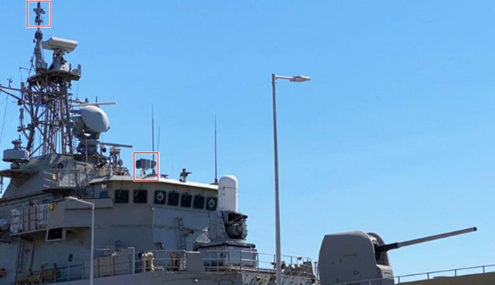 A generic square placeholder image with rounded corners in a figure.