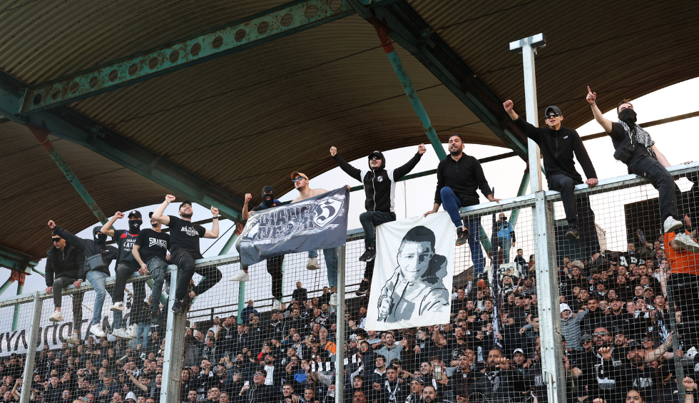 A generic square placeholder image with rounded corners in a figure.